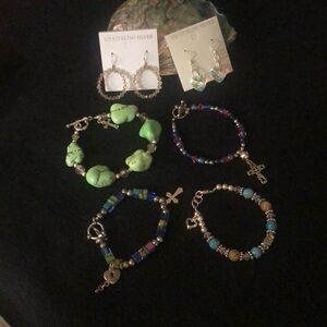 Sterling silver/Swarovski crystal bracelets (4) and earrings (2).